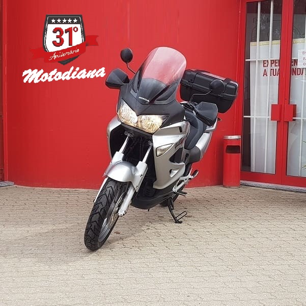 https://motodiana.com//public/uploads/Motos%20Usadas/Elementos_Graficos/42_AE_80_HONDAVARADERO_XL1000/0_5.jpg